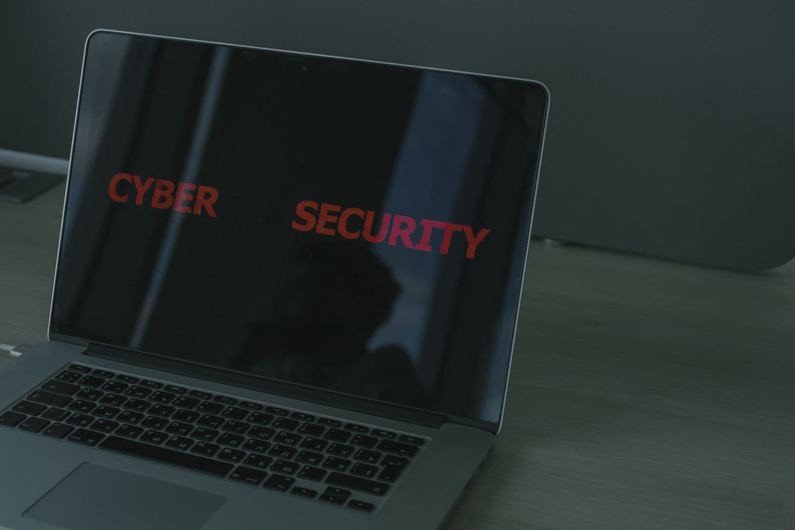 Laptop screen displaying the words Cyber Security